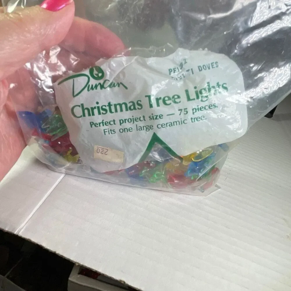 Duncan Doves lights for large ceramic tree. Approximately 130 pieces